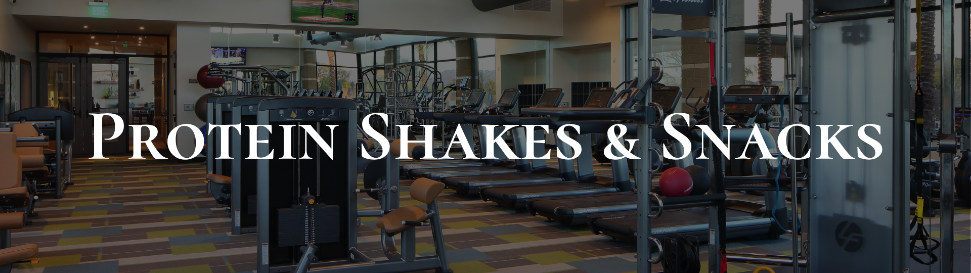 Digital display reading Protein Shakes & Snacks in a fitness center